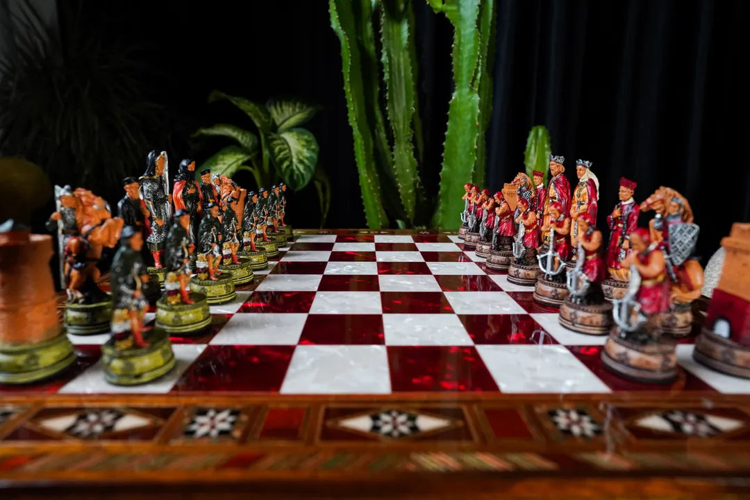 SchachAtelier Berlin Sammlerstücke decorative chess set with historical figures on red and white checkered board